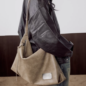Urban Drifter Tan Unisex Shoulder Bag with Soft Texture and Unique Metal Accent - Image 4