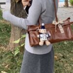 Throttle - themed Metallic - edged Brown Moto - style Handbag
